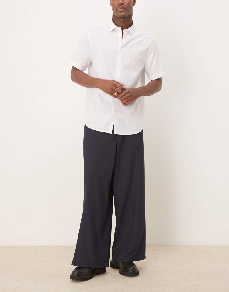 ASOS DESIGN horseshoe fit smart pants in seersucker in navy Asos Design