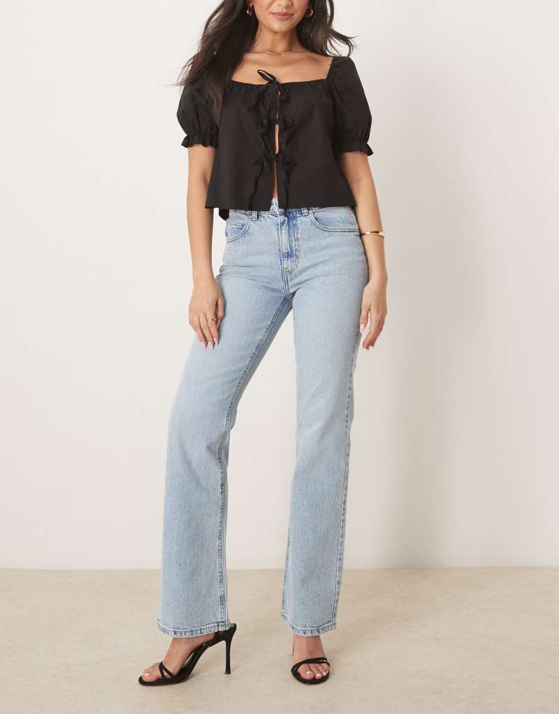 Gina Tricot mid rise bootcut flare stretch jeans in light wash blue Gina Tricot